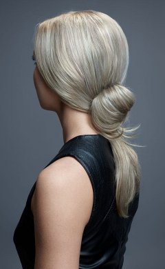 low-messy-half-bun-with-long-ponytail hair up  prom hairstyles and ideas at antonys for hair salon in Bury, manchester